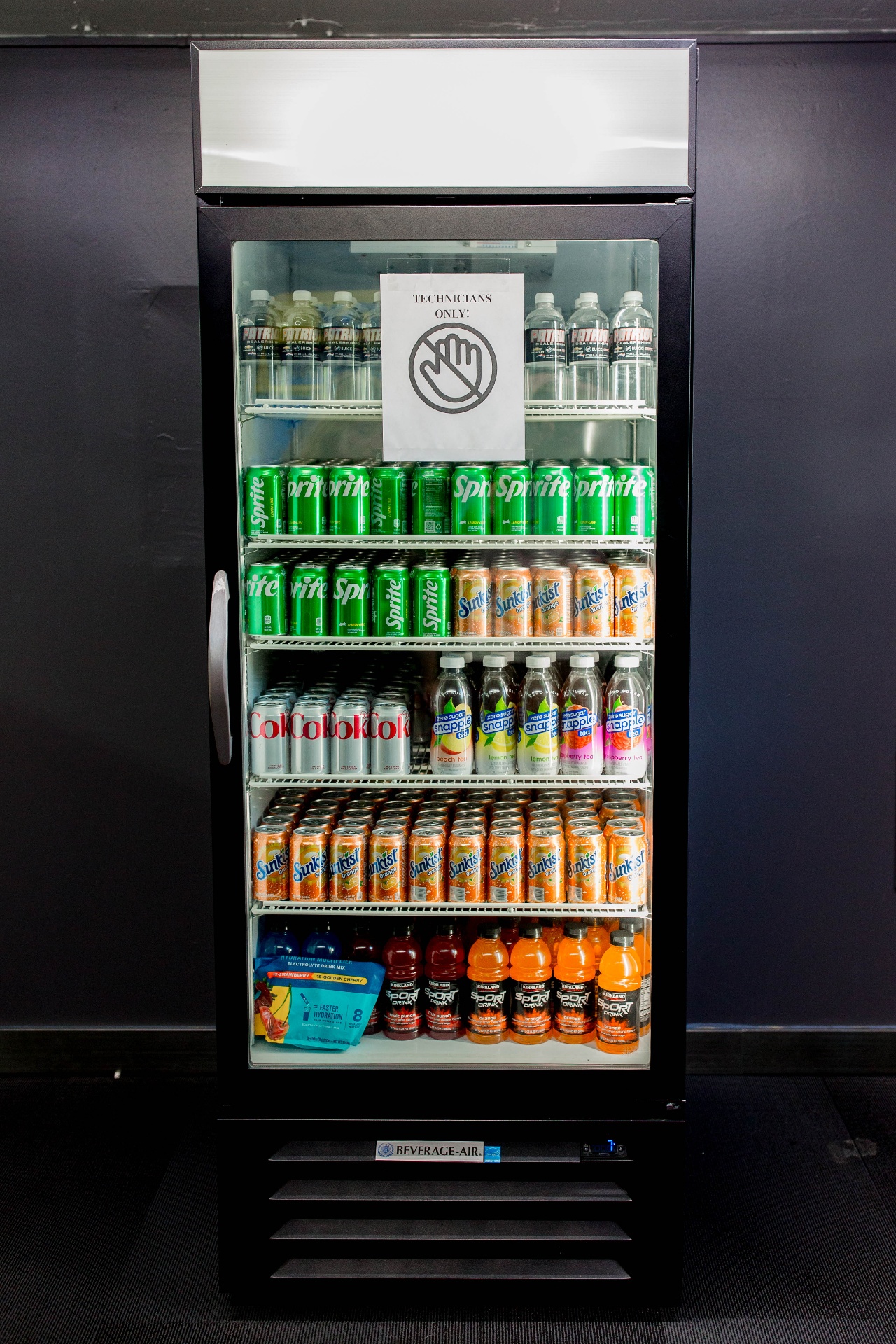 Technicians-only fridge stocked with drinks