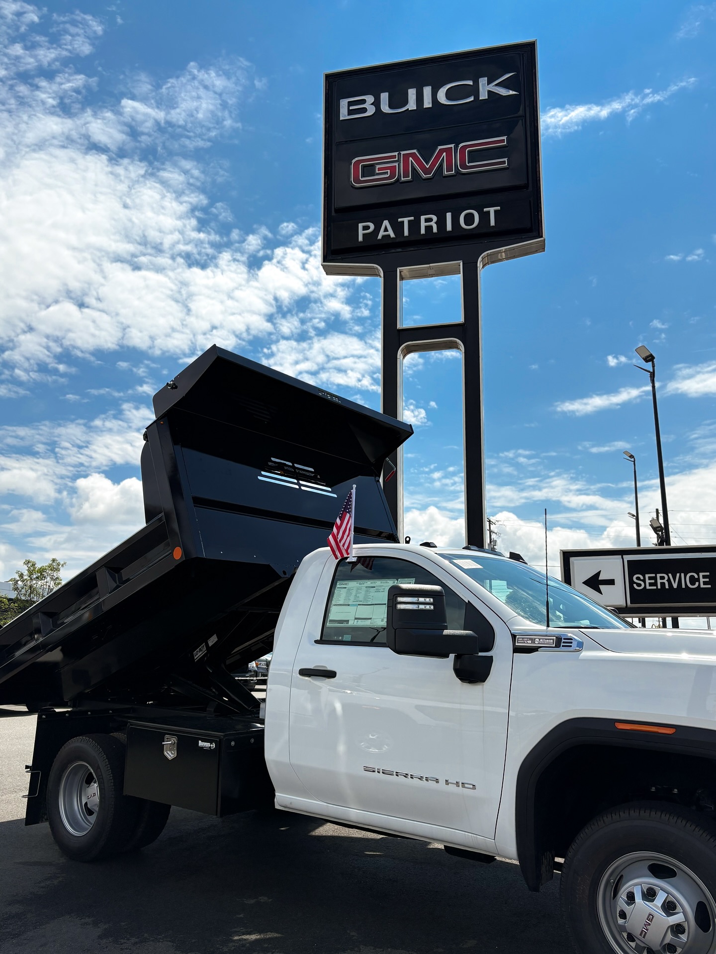 GMC Sierra HD under the Patriot sign
